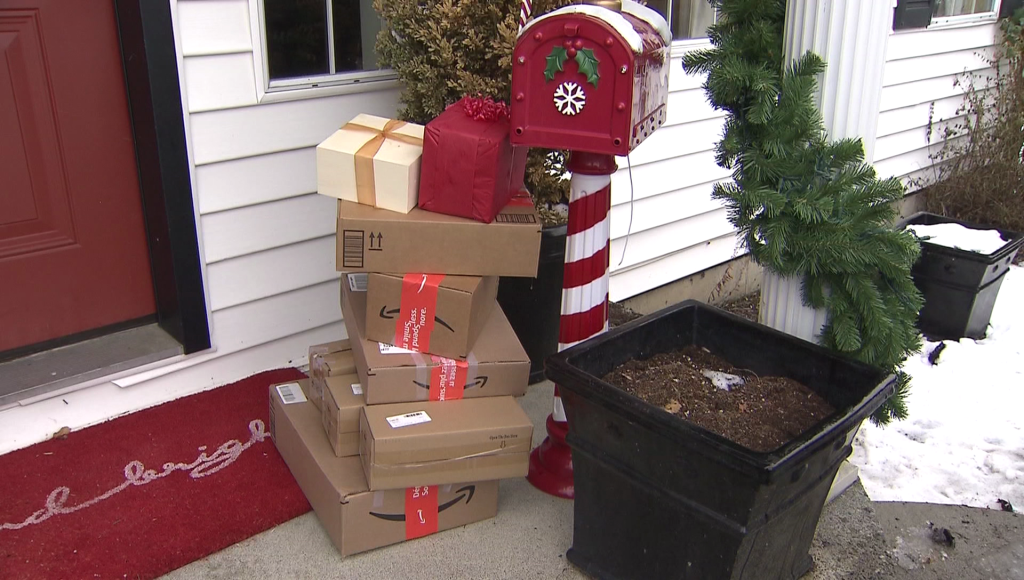 Presents and packages on a porch.