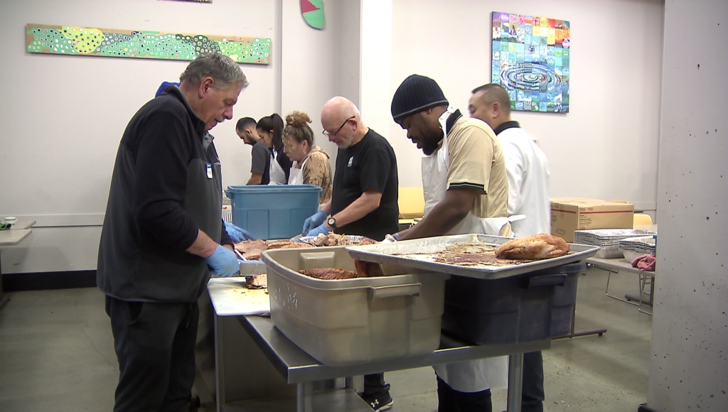 Volunteers and staff at the Union Gospel Mission preparing Christmas meals to feed 3,000 people this year.