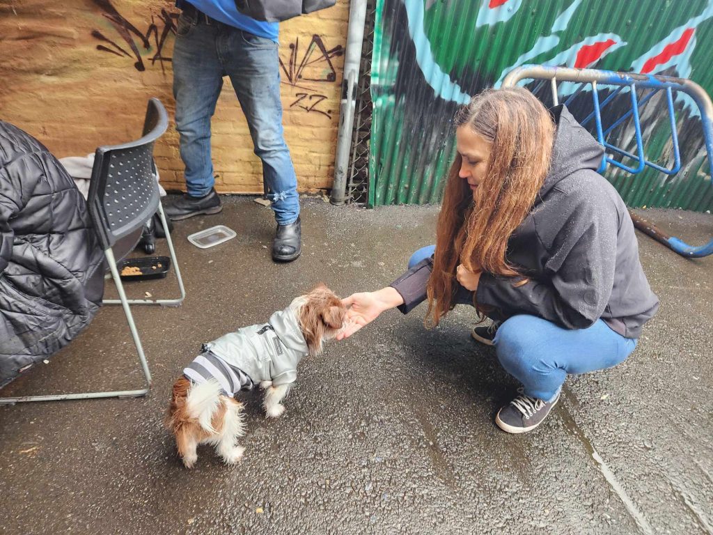 Kim Monteith, an outreach worker and dog trainer in Vancouver, works with Rufus the dog