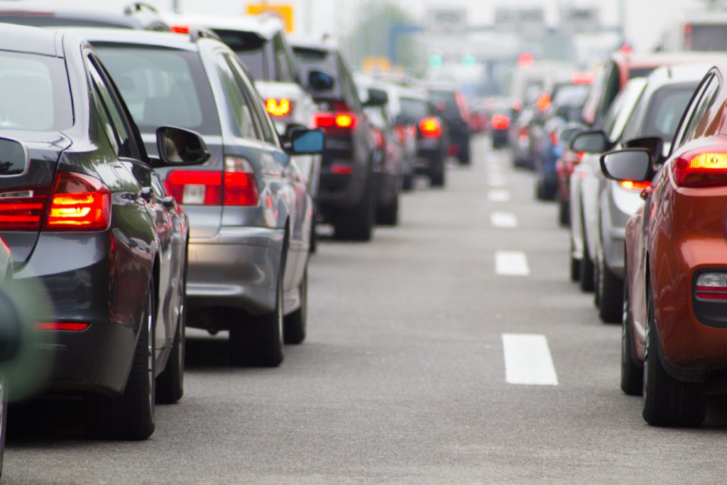 Cars pictured in two long rows during a traffic jam