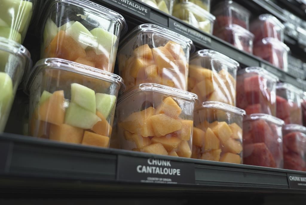 Cantaloupe pieces are displayed for sale at a supermarket in New York on Tuesday, Dec. 12, 2023. In 2023, hundreds of people in the U.S. and Canada have been sickened in a growing outbreak of salmonella poisoning linked to contaminated whole and pre-cut cantaloup