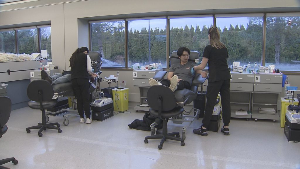 A person donates blood.