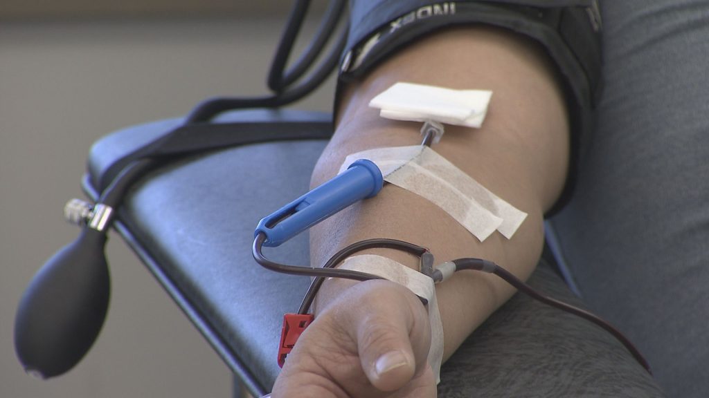 A person donates blood.