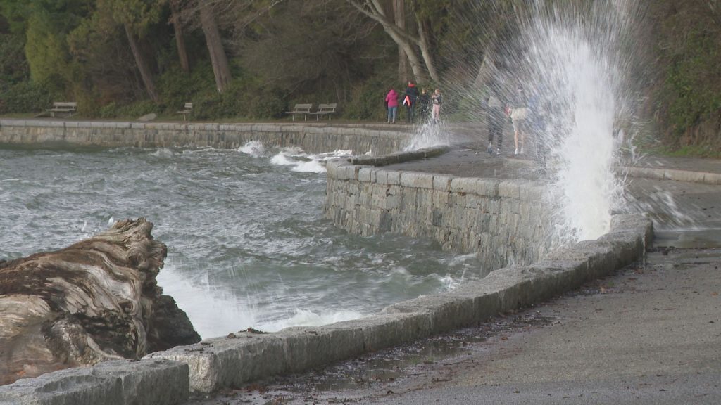 Waves crash against the seawall in Vancouver's Stanley Park