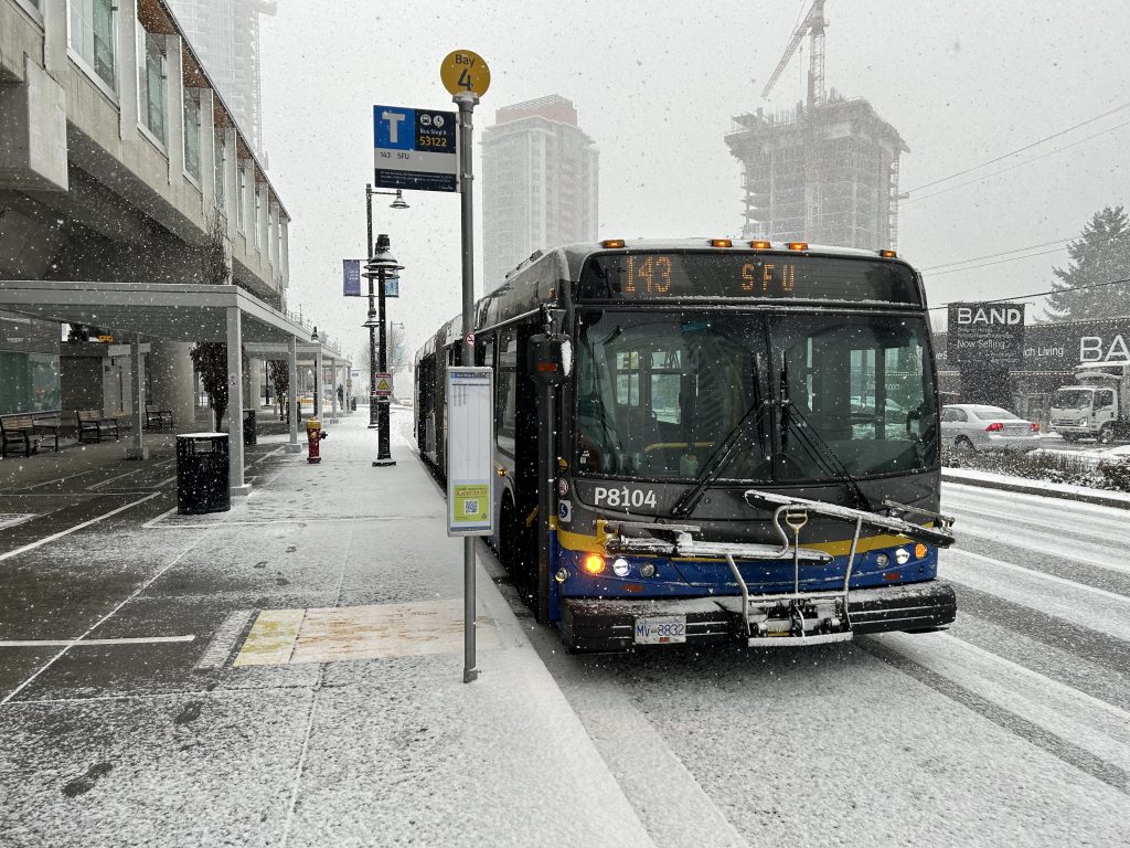 Snow covers a bus in Coquitlam on Jan. 11, 2024