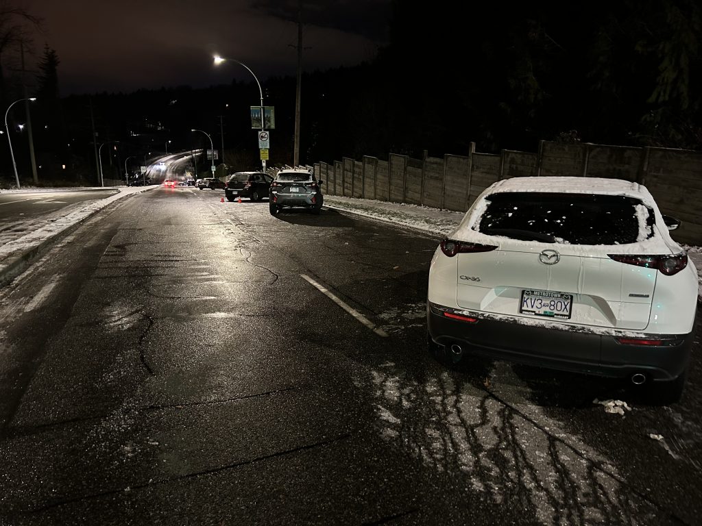 Abandoned vehicles sit along Broadway in Burnaby