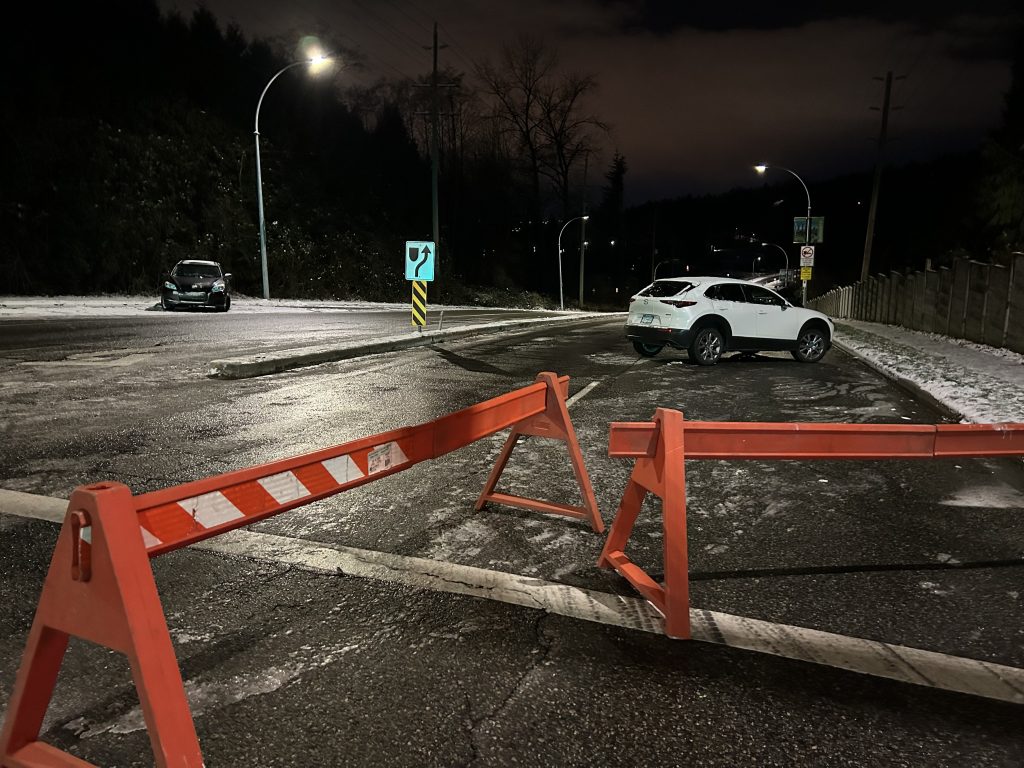 Abandoned vehicles sit along Broadway in Burnaby