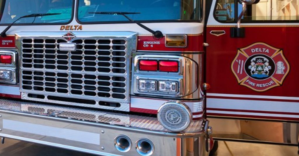 The front view of a Delta Fire Rescue truck.