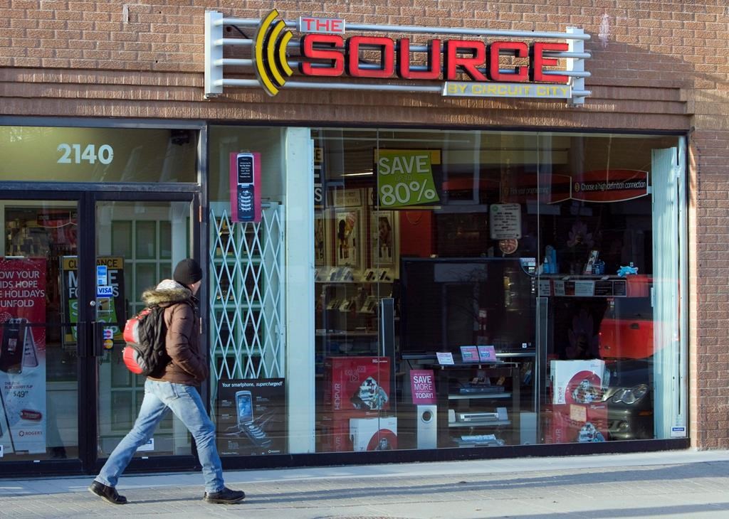 Best Buy Canada and Bell Canada have announced a partnership to rebrand and revamp 165 The Source stores. A man walks past The Source store in Toronto on Monday, March 2, 2009