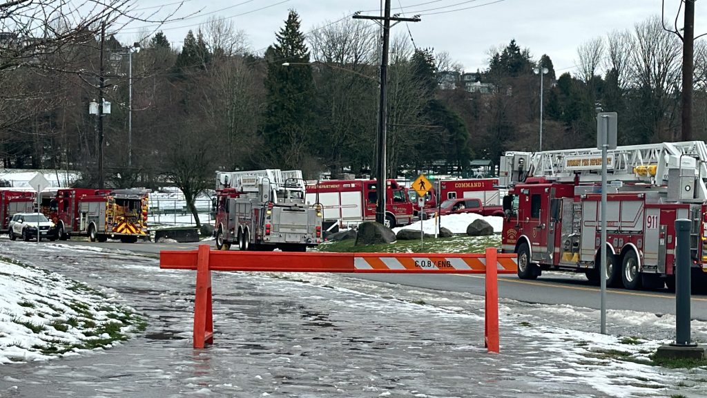 Emergency vehicles block the entrance to the Parkland refinery in Burnaby near Confederation Park after a fire at the refinery cloaked Vancouver in a foul odour