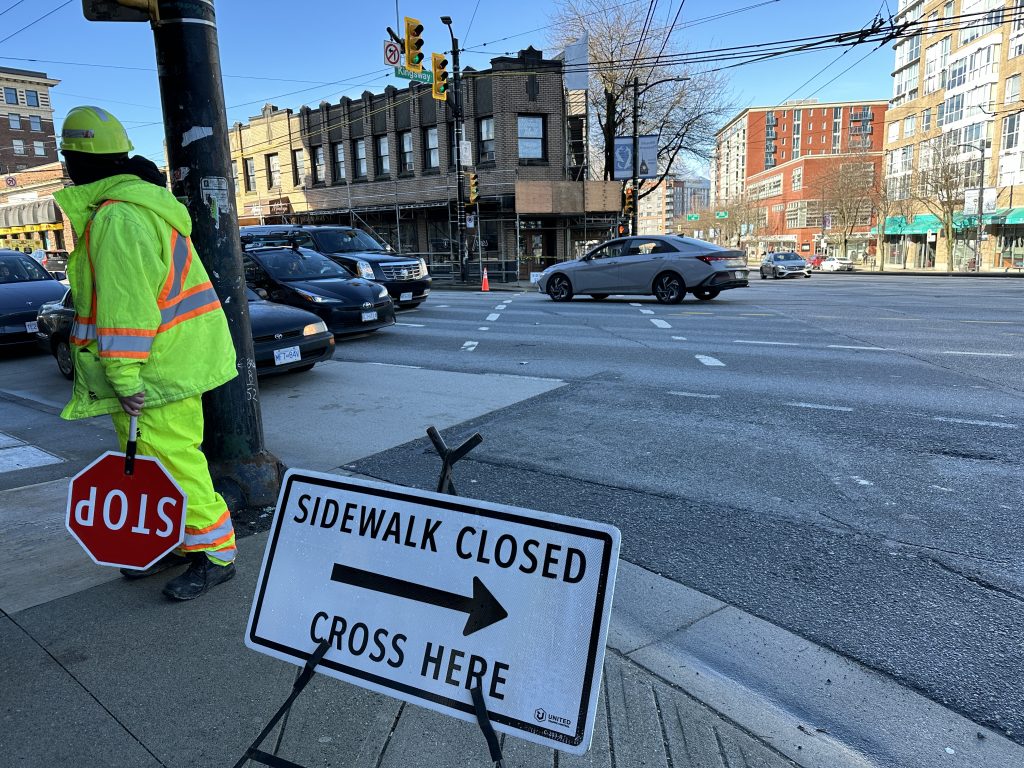 Closed signs near a heritage building in the area of Kingsway and East Broadway on Feb.12, 2024. The Mount Pleasant businesses in the building say they've been forced to close due to concerns with the structure's façade. 