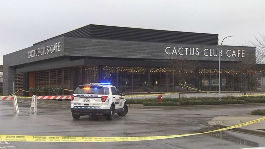 Yellow police tape is up around the Cactus Club at Coquitlam Centre Monday morning after a shooting