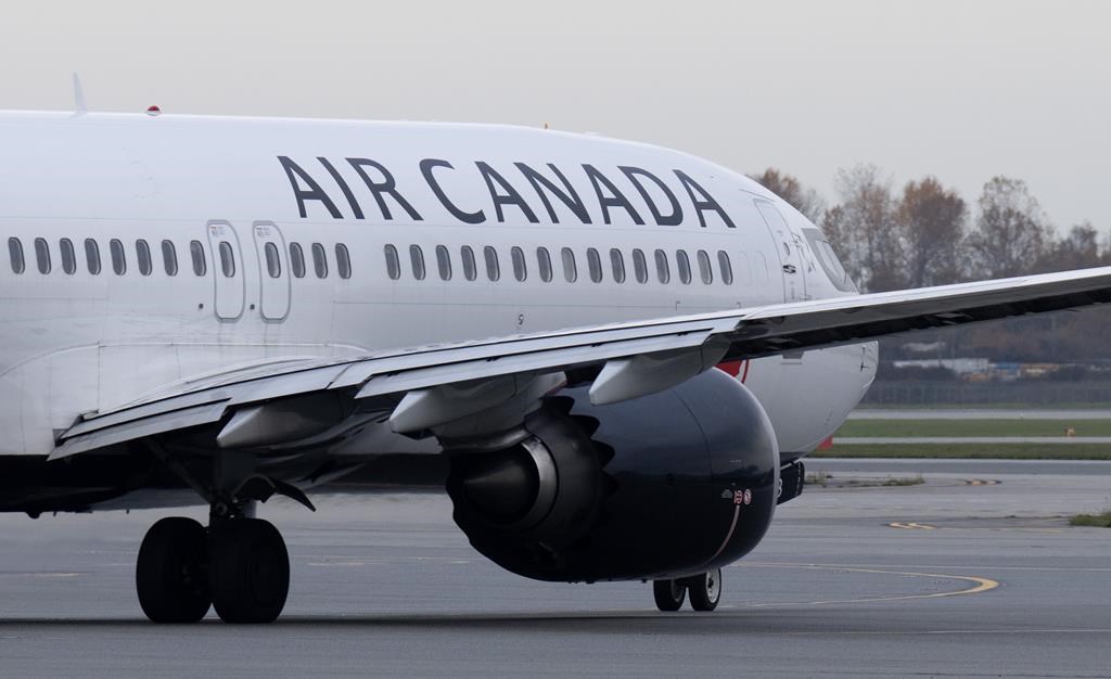 An Air Canada jet taxis at the airport, Wednesday, November 15, 2023 in Vancouver.