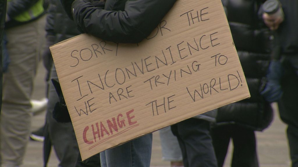 Various groups gather outside the Vancouver Art Gallery