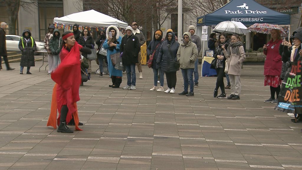 Various groups gather outside the Vancouver Art Gallery