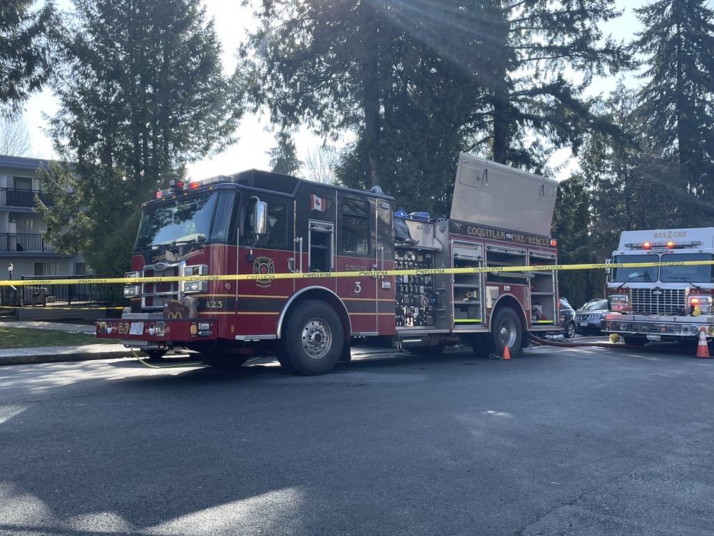 Fire trucks at the scene of an apartment building that was evacuated after an early-morning blaze on Thursday, March 7, 2024. 