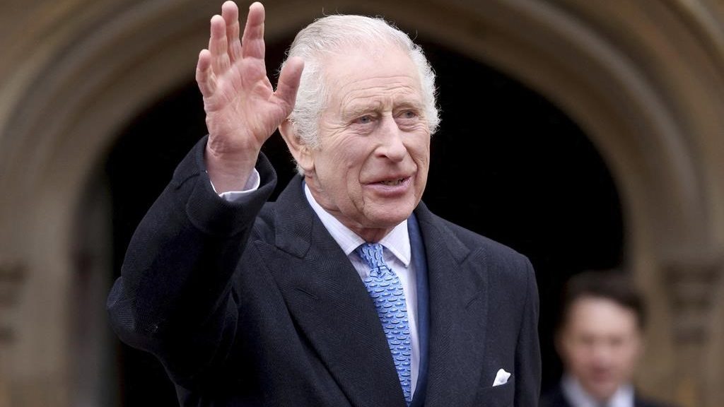 Britain's King Charles III waves as he leaves after attending the Easter Matins Service at St. George's Chapel, Windsor Castle, England, on March 31, 2024.