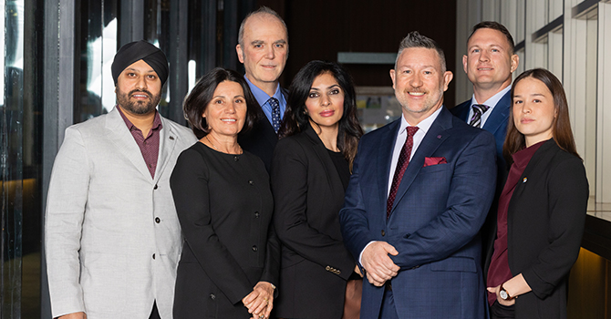 Commissioner Brennan Bastyovanszky (second from right) is accused of improperly using his position to get back-stage access to a PNE Summer Night Concert performance last year. (Courtesy City of Vancouver)