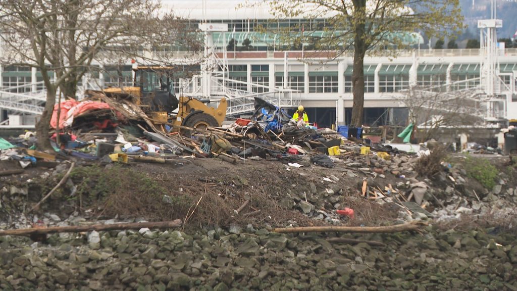 Heavy machinery arrives in Vancouver's CRAB Park for clean-up work on Tuesday, March 26, 2024.