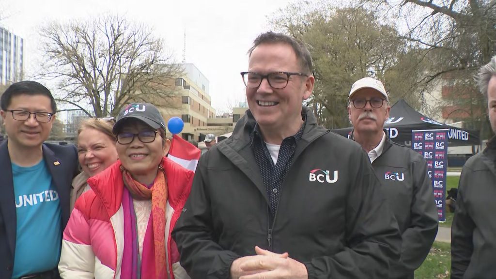 BC United Leader Kevin Falcon speaks at a gathering of residents and politicians in Richmond on April 1, 2024 to rally against the latest carbon tax increase in B.C.