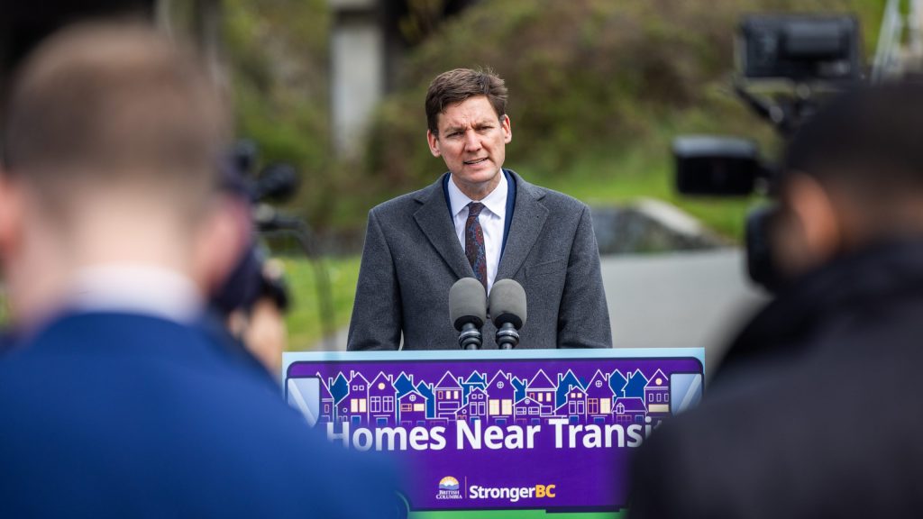 B.C. Premier David Eby speaks near the Uptown area of Saanich