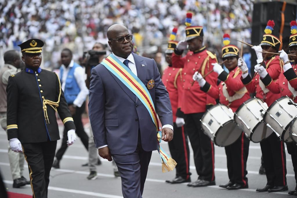 FILE - Congo's President Felix Tshisekedi reviews an honor guard during his swearing-in ceremony for a second term in Kinshasa, Democratic Republic of the Congo, Saturday, Jan. 20, 2024