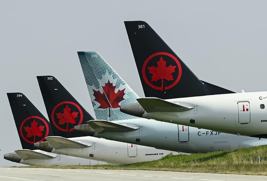 Air Canada planes sit on the tarmac at Pearson International Airport Toronto on Wednesday, April 28, 2021.