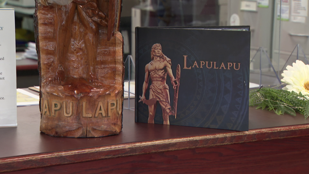 Photo of a book and artifact related to Lapu-Lapu