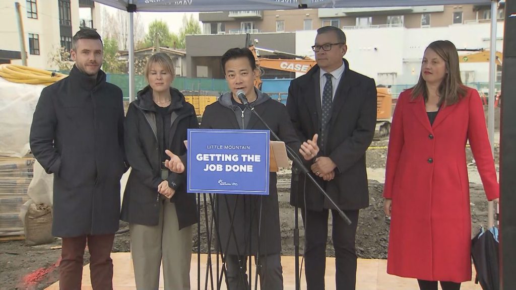 Vancouver Mayor Ken Sim speaks to the media