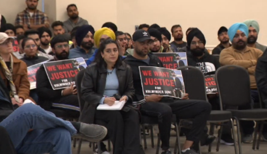 People gathered at the White Rock Community Centre on Tuesday, April 30, 2024, to talk about safety concerns after a pair of stabbings just days apart along the city's waterfront. A large group carried signs calling for justice in the stabbing death of Kulwinder Singh Sohi