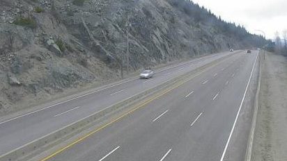 Image of Coquihalla Summit, around 7 km north of Zopkios Brake Check, looking north. The stretch of highway appears clear Sunday afternoon, but parts of the Highway between Hope and Merritt may experience flurries through Monday, according to a Special Weather Statement.