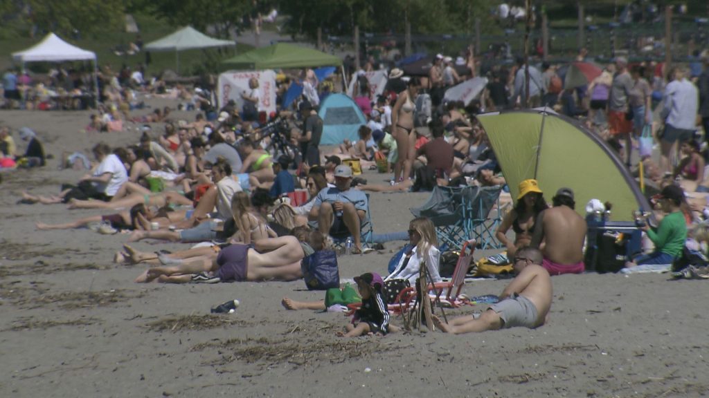 Sunny and warm weather is seen at Kits Beach in Vancouver
