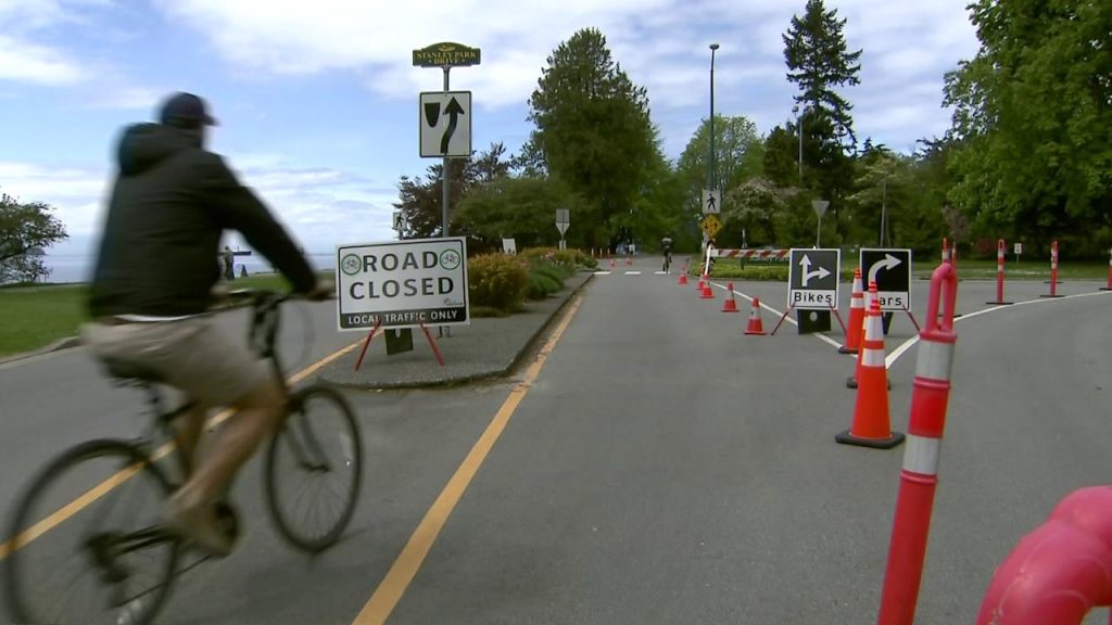 FILE -- A man bikes along a vehicle-restricted road in Stanley Park. (CityNews Vancouver)