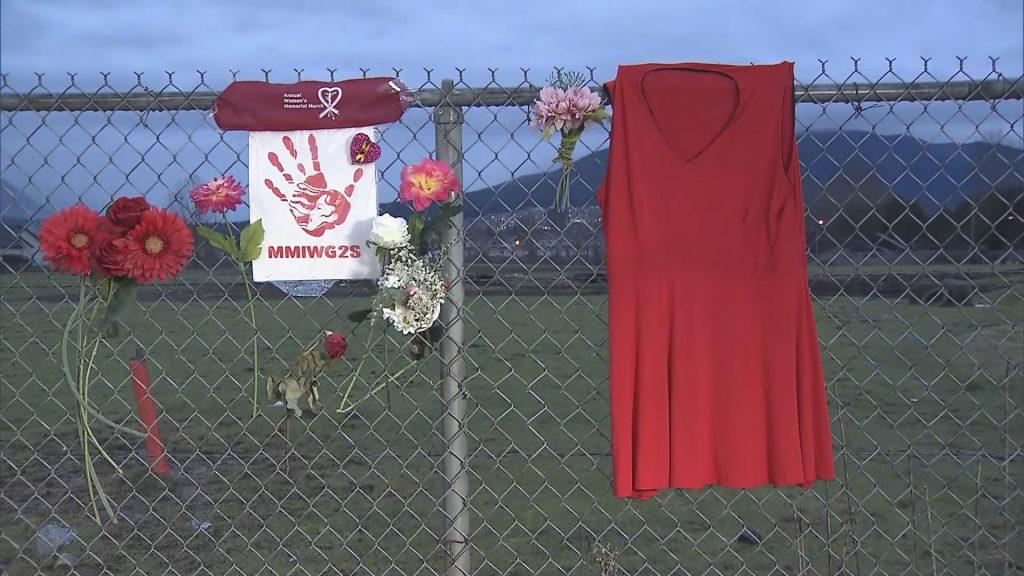 Mementos honouring victims hang on a fence outside Pickton's former farm.