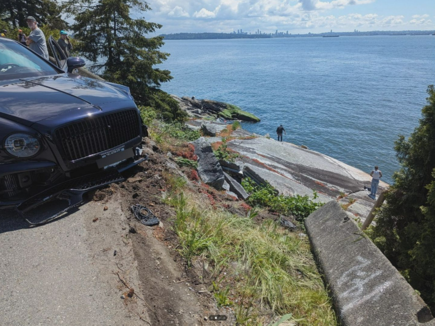 The driver and passenger of a Volkswagen are recovering after ending up in the ocean off West Vancouver after a crash Monday. (Courtesy Reddit / @bikemanyvr)