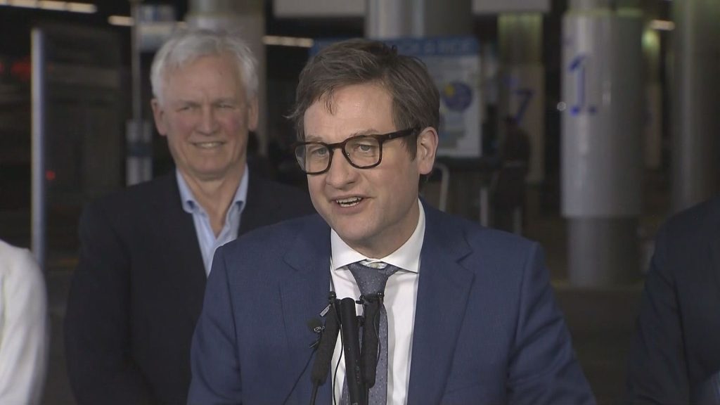 B.C. Transportation Minister Rob Fleming speaks outside the SeaBus Terminal