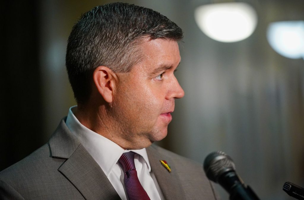 Saskatchewan Premier Scott Moe says cabinet minister Jeremy Harrison isn't a liar and couldn't initially remember bringing a long gun into the legislature a decade ago. Harrison speaks to the media at the Saskatchewan legislature in Regina, Tuesday, Oct. 10, 2023.