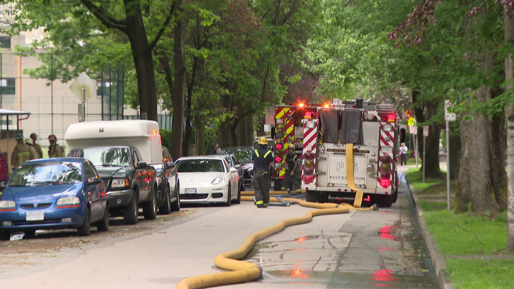 A Vancouver fire truck at a West End apartment complex after flames erupted from a suite on June 5, 2024.