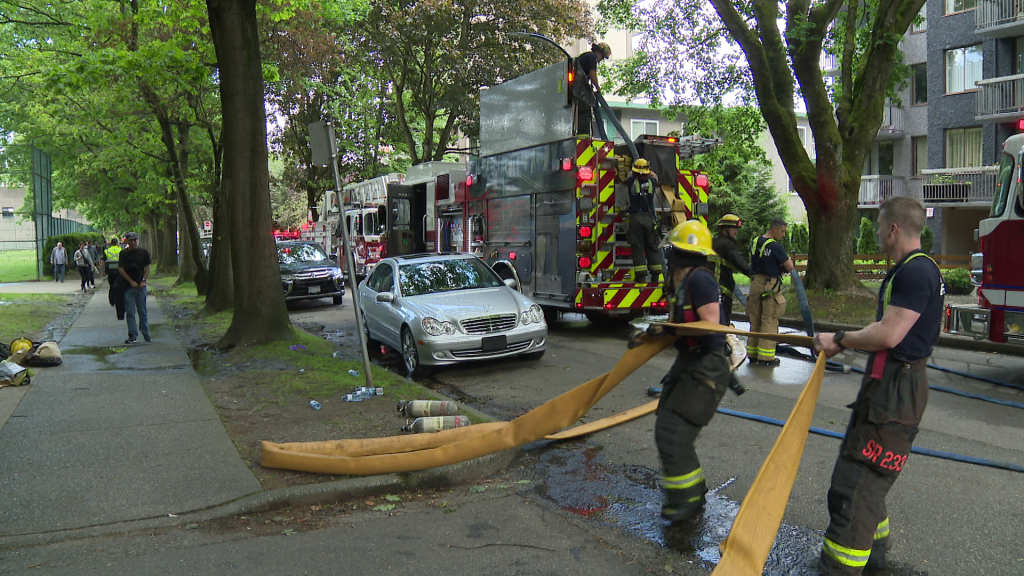 A Vancouver fire truck at a West End apartment complex after flames erupted from a suite on June 5, 2024.