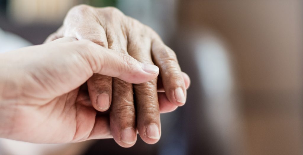 Two hands holding each other. B.C.'s new Seniors Advocate is calling on the government to take immediate action, saying this demographic is feeling "invisible and forgotten."