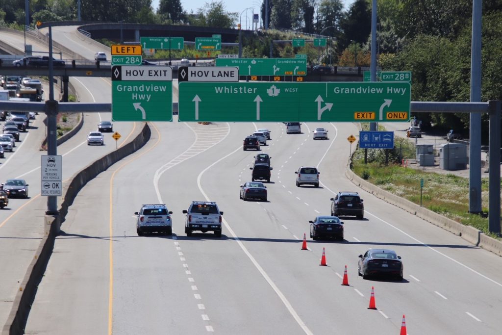 Police on scene investigating a incident on Highway 1 near Willingdon in Burnaby, B.C. on Thursday June 6, 2024.
