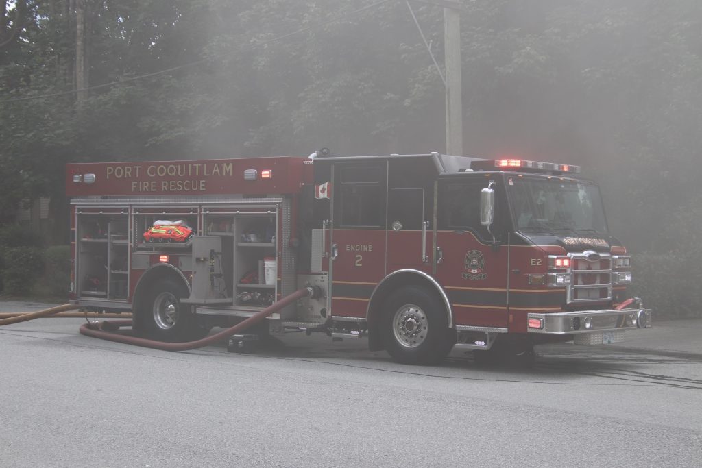 Fire crews battle a blaze in Port Coquitlam on Tuesday June 18, 2024.