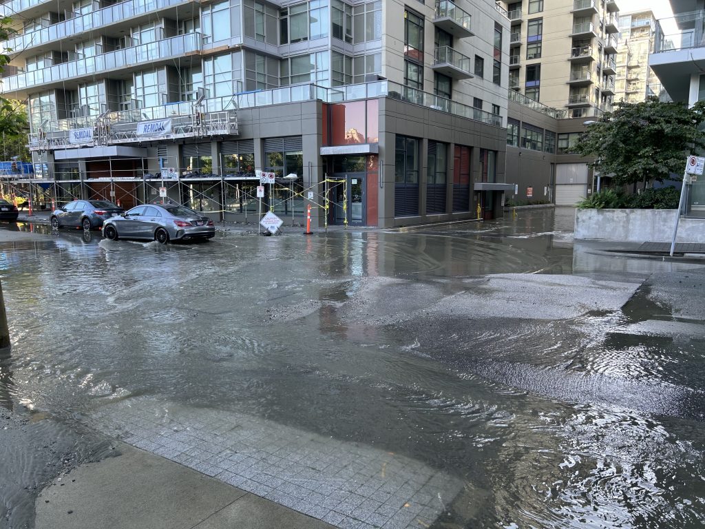 About six to eight inches of effluent was pooling on Columbia Street near West 2nd Avenue in the city's Olympic Village neighbourhood just before 6 a.m.