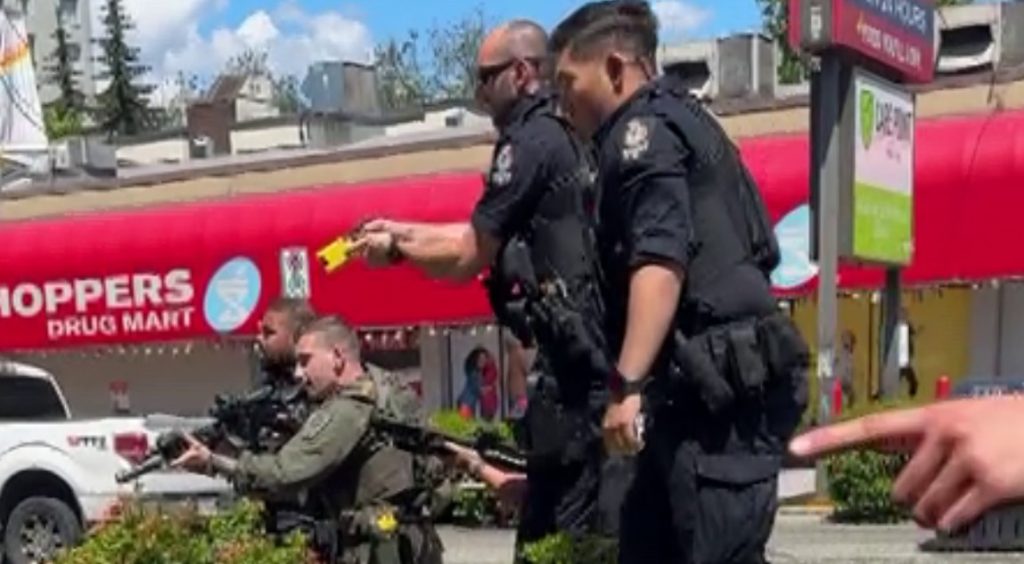 The VPD says a man has now been charged after a video of his dramatic arrest on a patio on Vancouver's Davie Street garnered attention online this week.