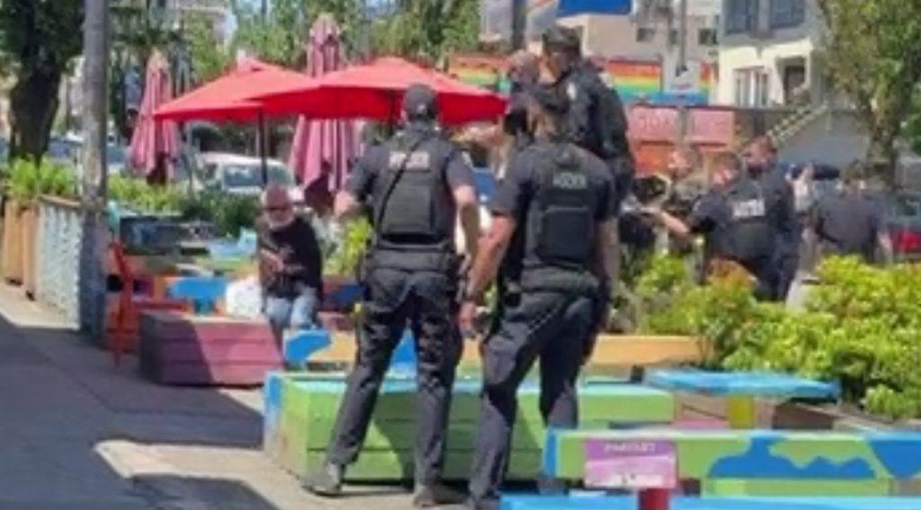 The VPD says a man has now been charged after a video of his dramatic arrest on a patio on Vancouver's Davie Street garnered attention online this week.