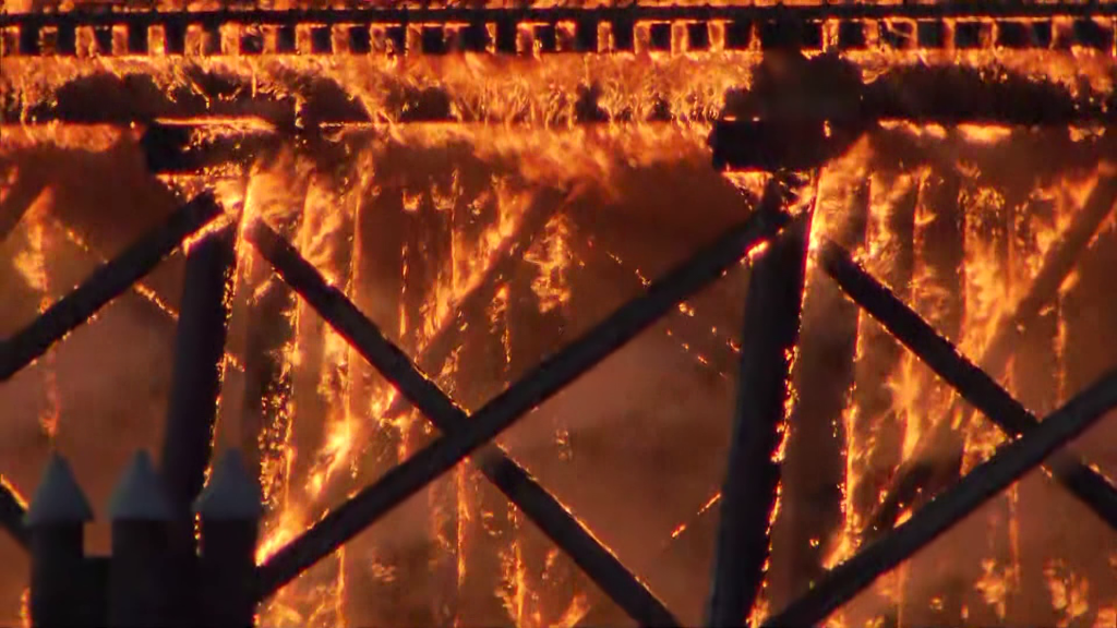 A fire on the Marpole Rail Trestle Bridge on Thursday June 21, 2024