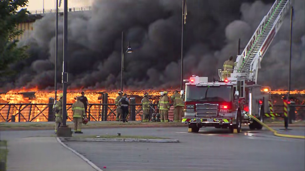 A fire on the Marpole Rail Trestle Bridge on Thursday June 21, 2024