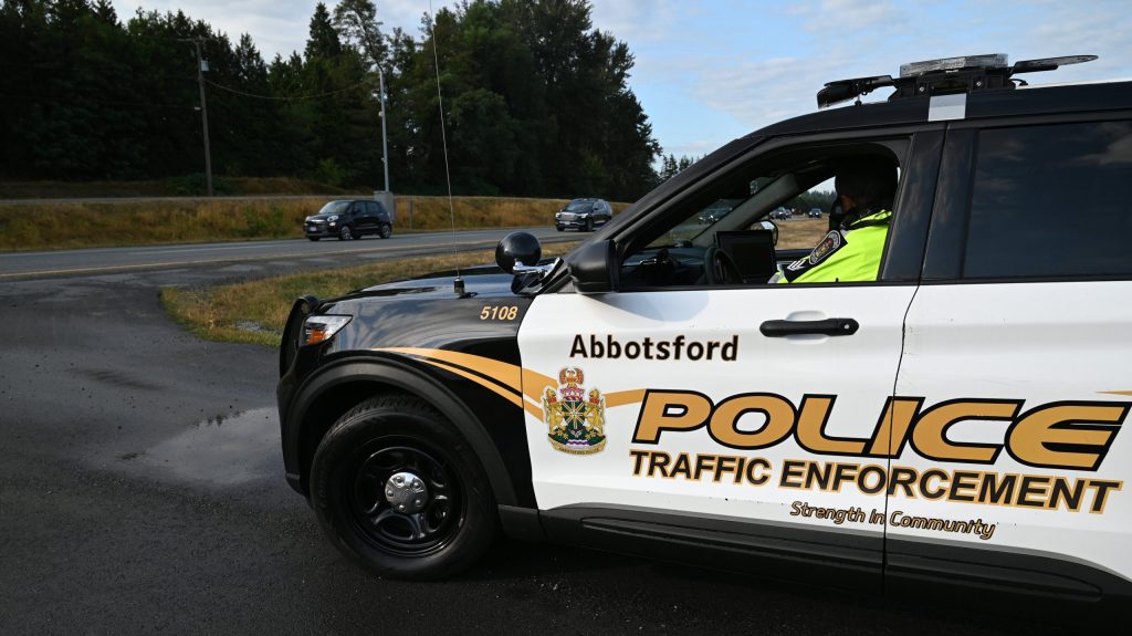 A traffic enforcement vehicle parked along an Abbotsford road