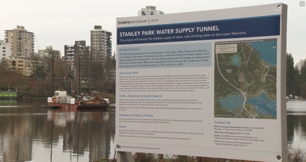 A photo of the Stanley Park Water Supply project poster outdoors