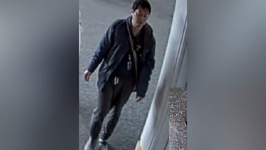 The Surrey RCMP is looking to identify a suspect after an alleged case of voyeurism in the bathroom of an "educational facility" in March 2024.